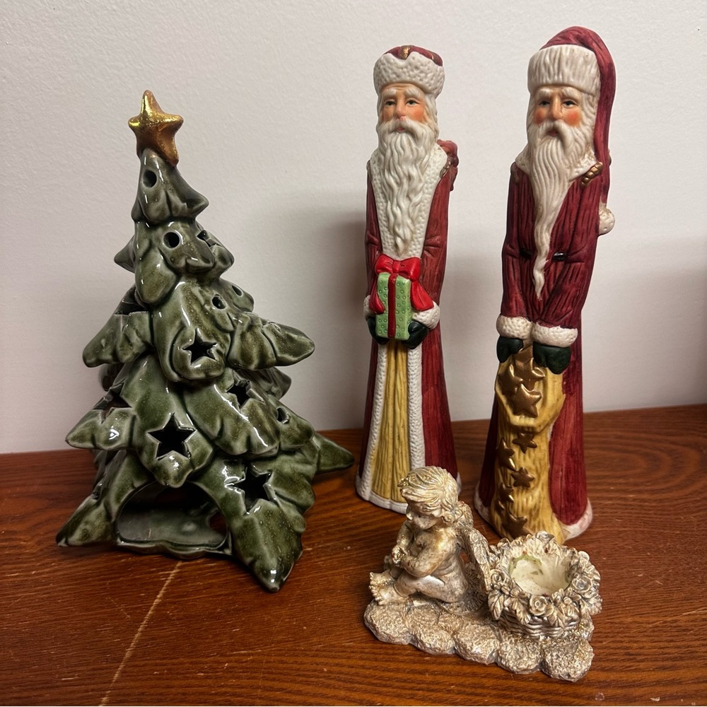 Santas of the world candle holder set of 4.